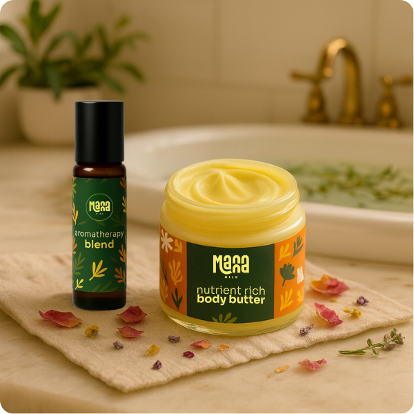 Manna Oils body butter and aromatherapy blend on a spa towel — symbolizing self-care and natural wellness.
